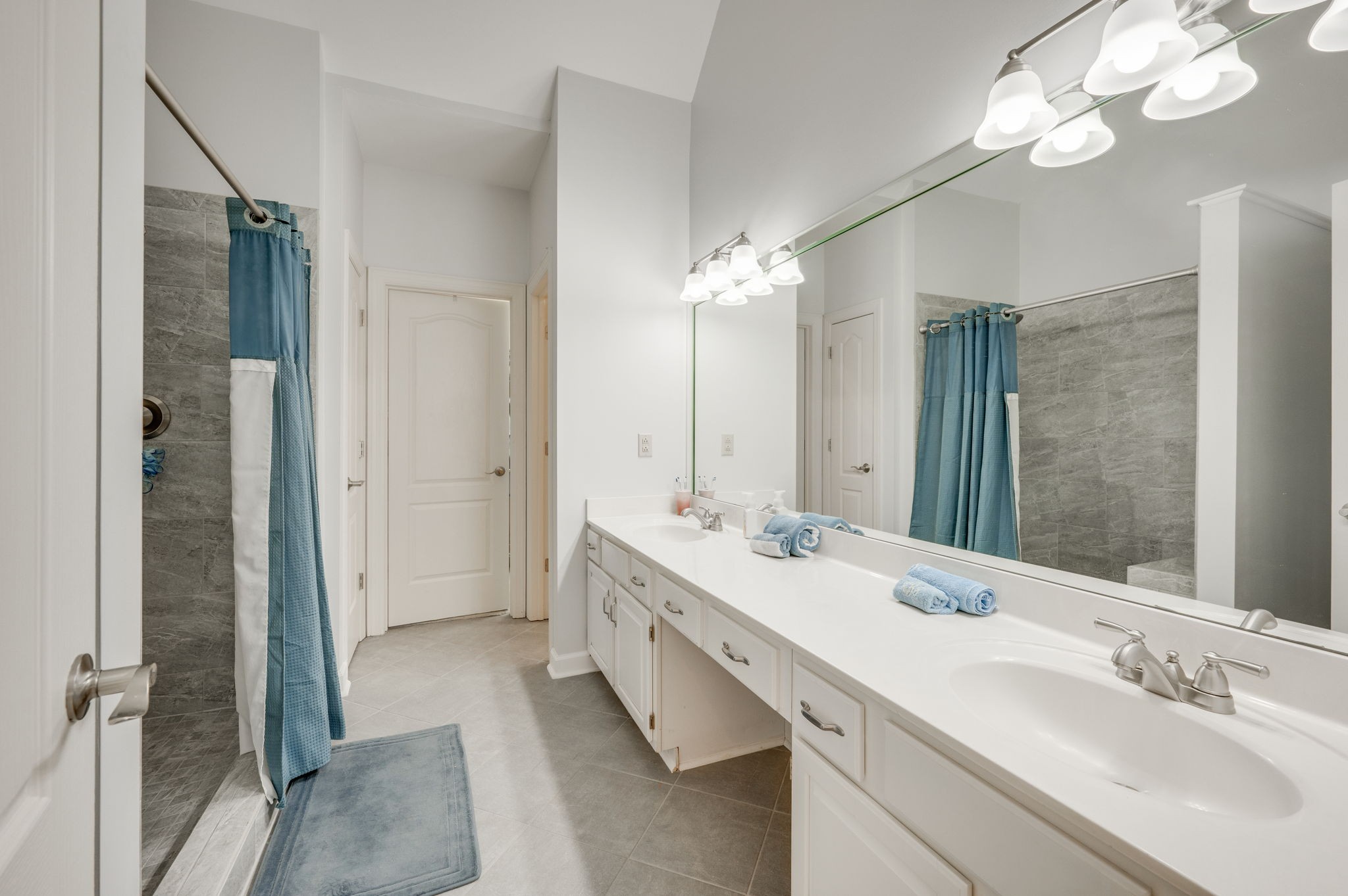 1705 Fieldcrest Circle Franklin, TN 37064 - Photo 29 of 45 a spacious bathroom with a double vanity sink mirror and shower