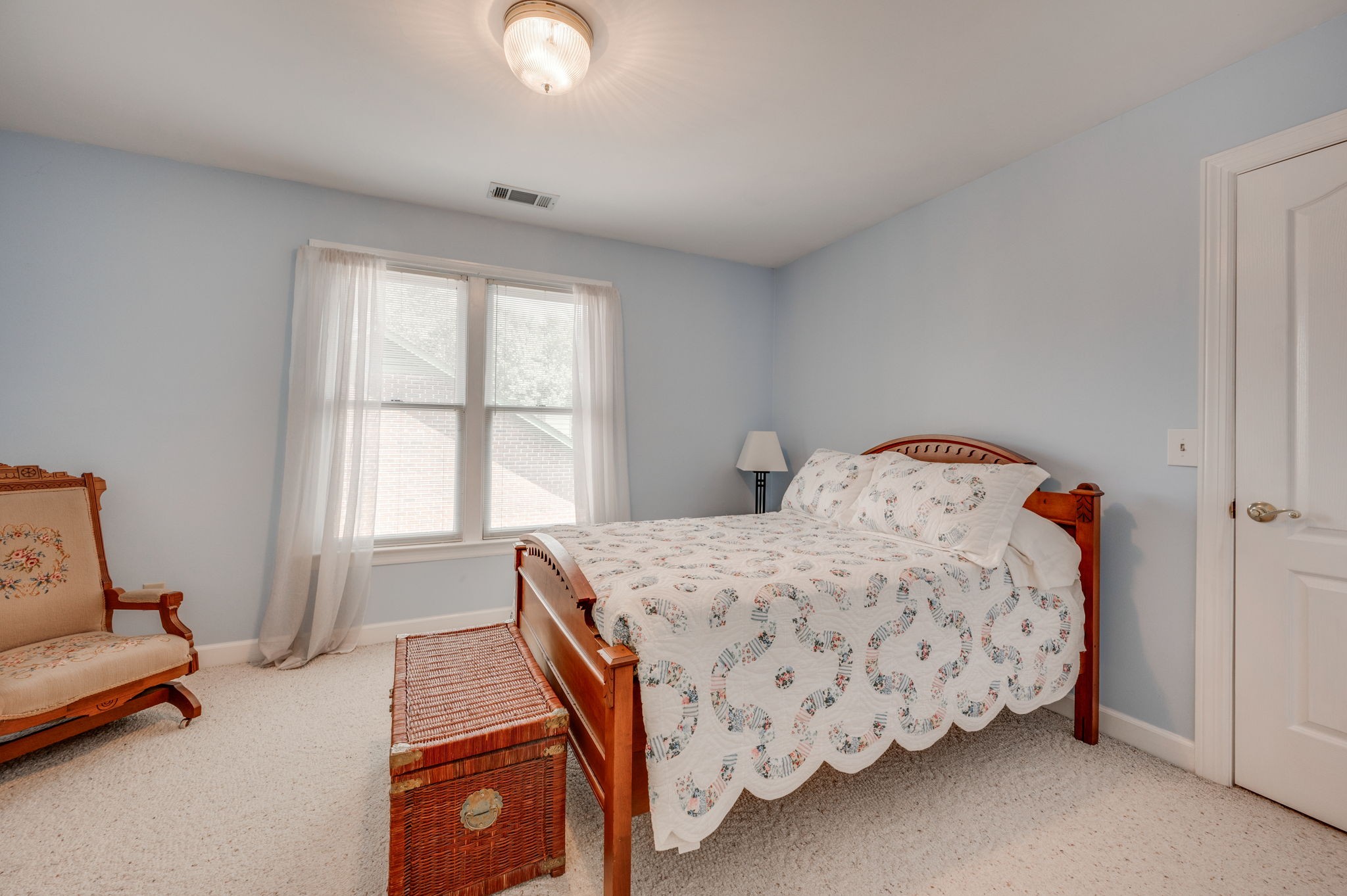 1705 Fieldcrest Circle Franklin, TN 37064 - Photo 38 of 45 a bedroom with a bed and a couch