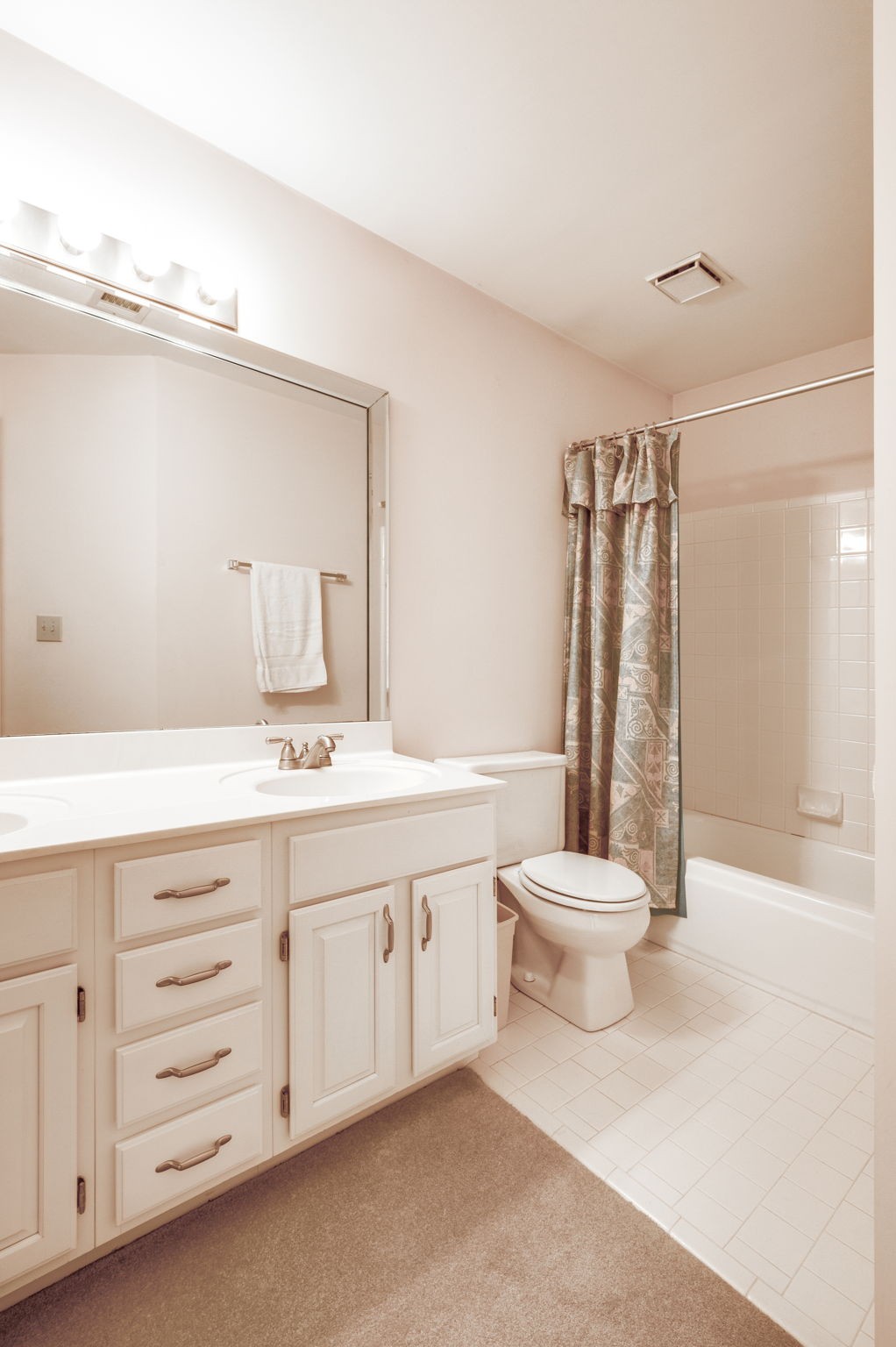 1705 Fieldcrest Circle Franklin, TN 37064 - Photo 41 of 45 a bathroom with a double vanity sink toilet and shower