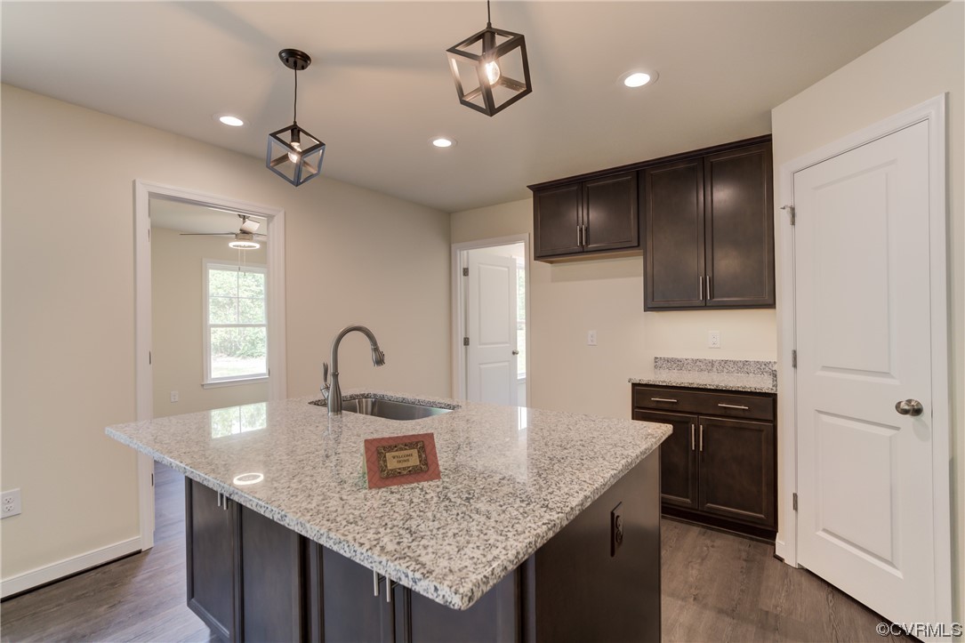 400 New S Ridge Road Bumpass, VA 23024 - Photo 18 of 41 a kitchen with stainless steel appliances granite countertop a sink a stove and a refrigerator