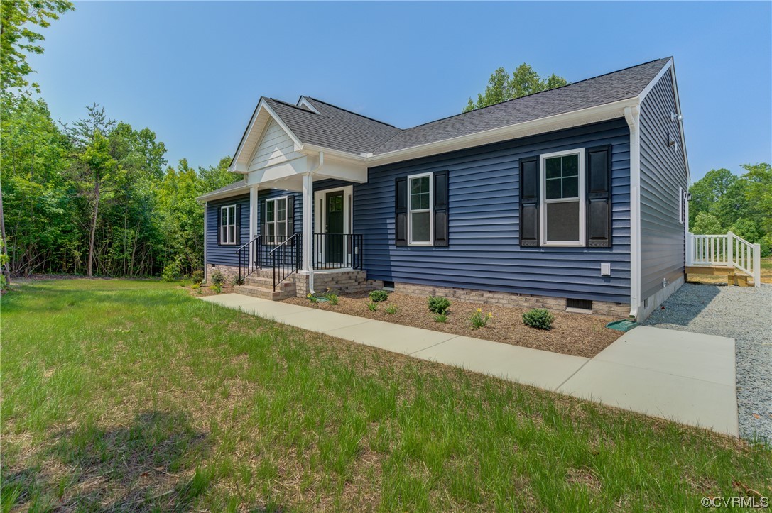 400 New S Ridge Road Bumpass, VA 23024 - Photo 4 of 41 a view of house with a yard