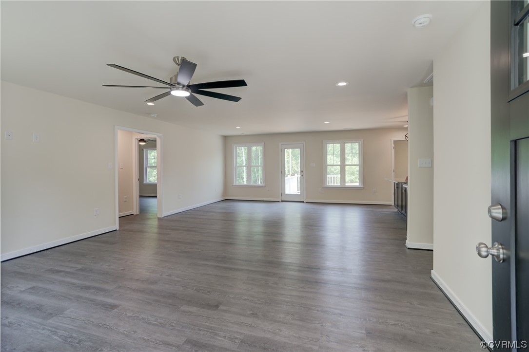 400 New S Ridge Road Bumpass, VA 23024 - Photo 8 of 41 wooden floor in an empty room with a window