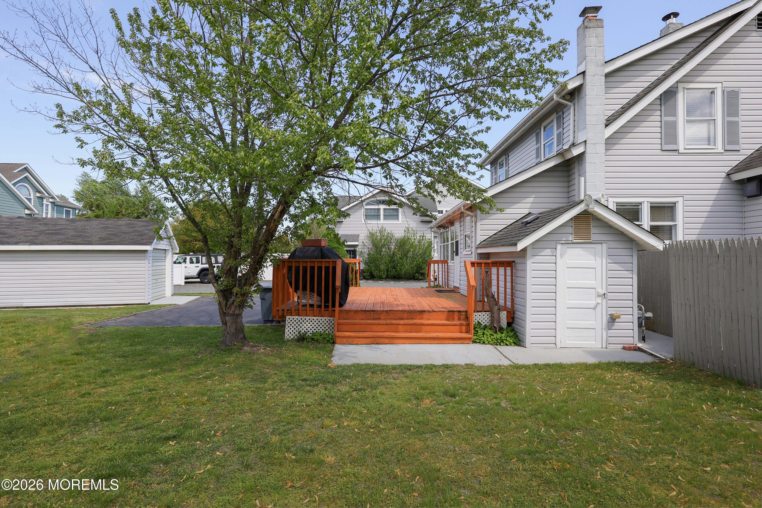 715 Howe Street Point Pleasant, NJ 08742 - Photo 25 of 45 a front view of a house with a yard