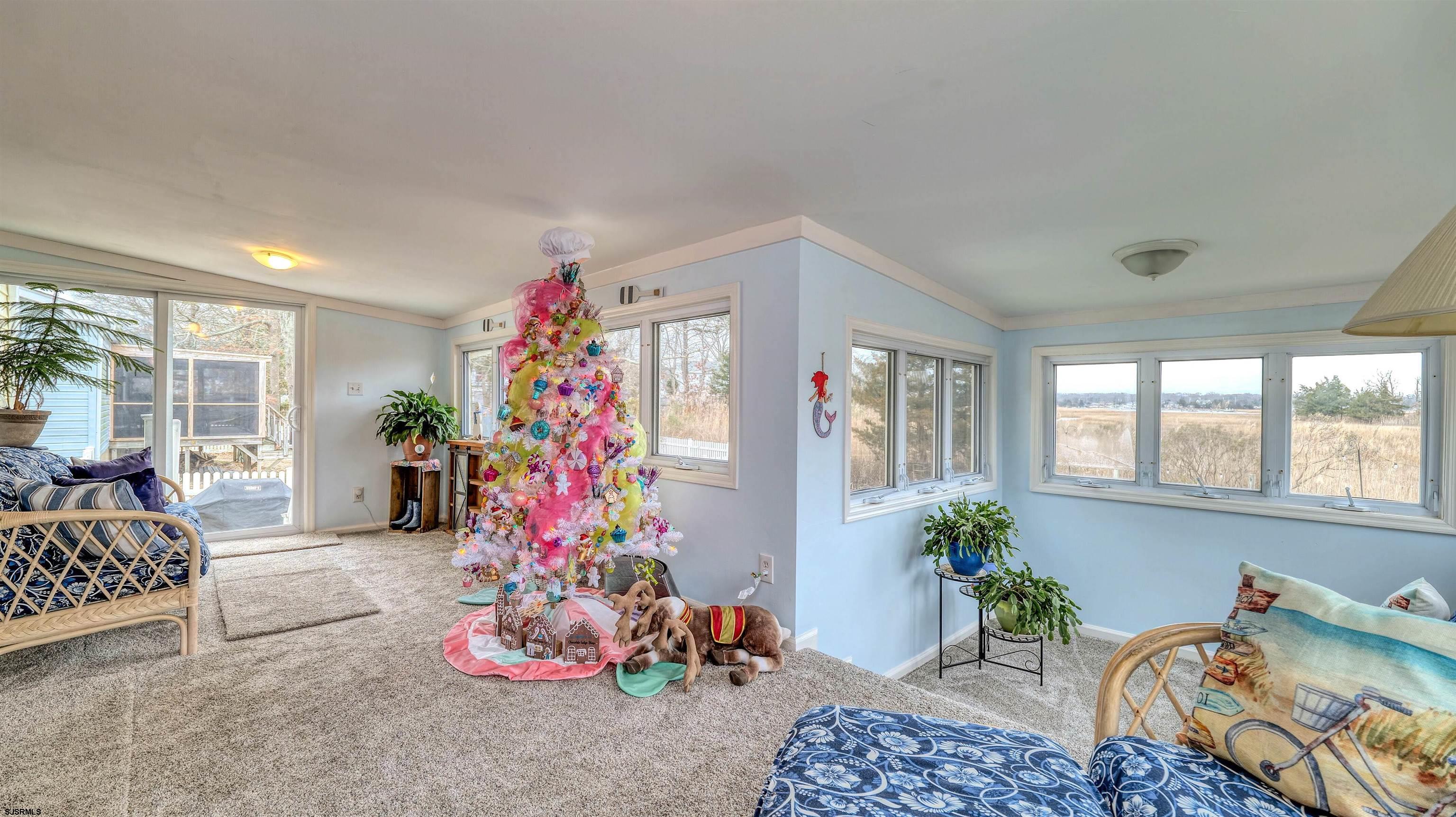 33 Defeo Lane Somers Point, NJ 08244 - Photo 11 of 29 a living room with furniture and flowers