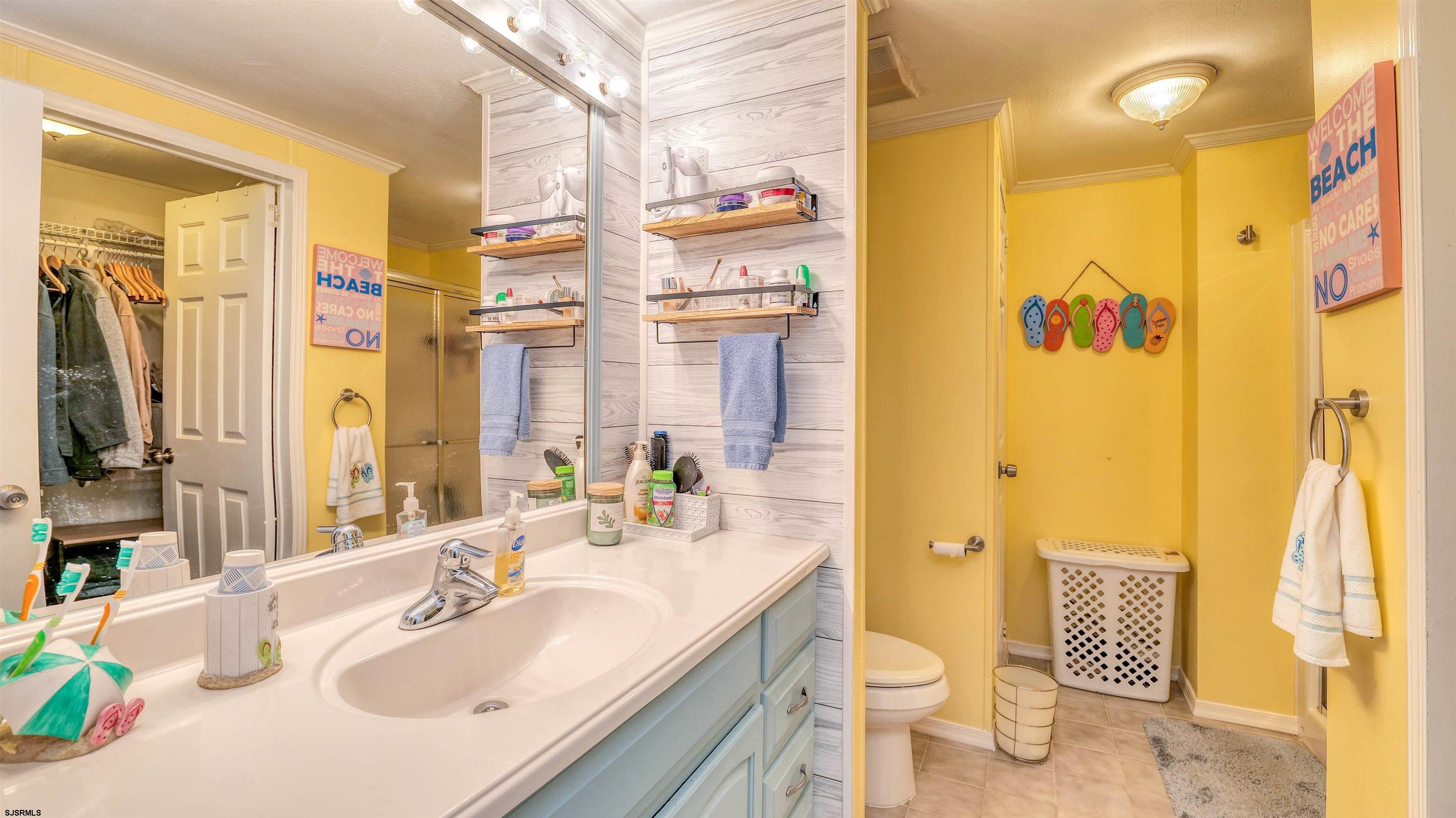 33 Defeo Lane Somers Point, NJ 08244 - Photo 16 of 29 a bathroom with a granite countertop sink toilet and shower