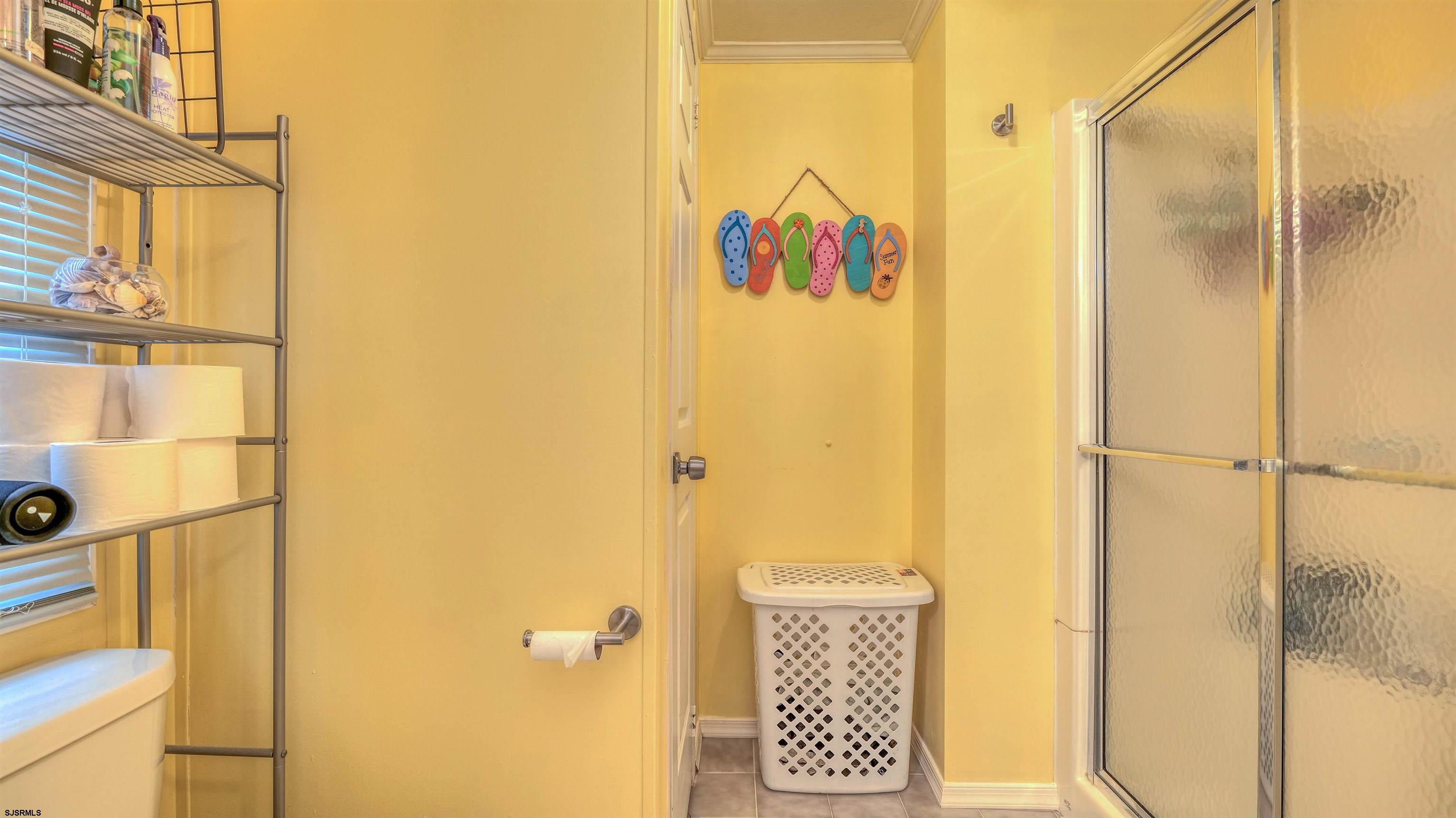 33 Defeo Lane Somers Point, NJ 08244 - Photo 18 of 29 a bathroom with a shower and a glass door