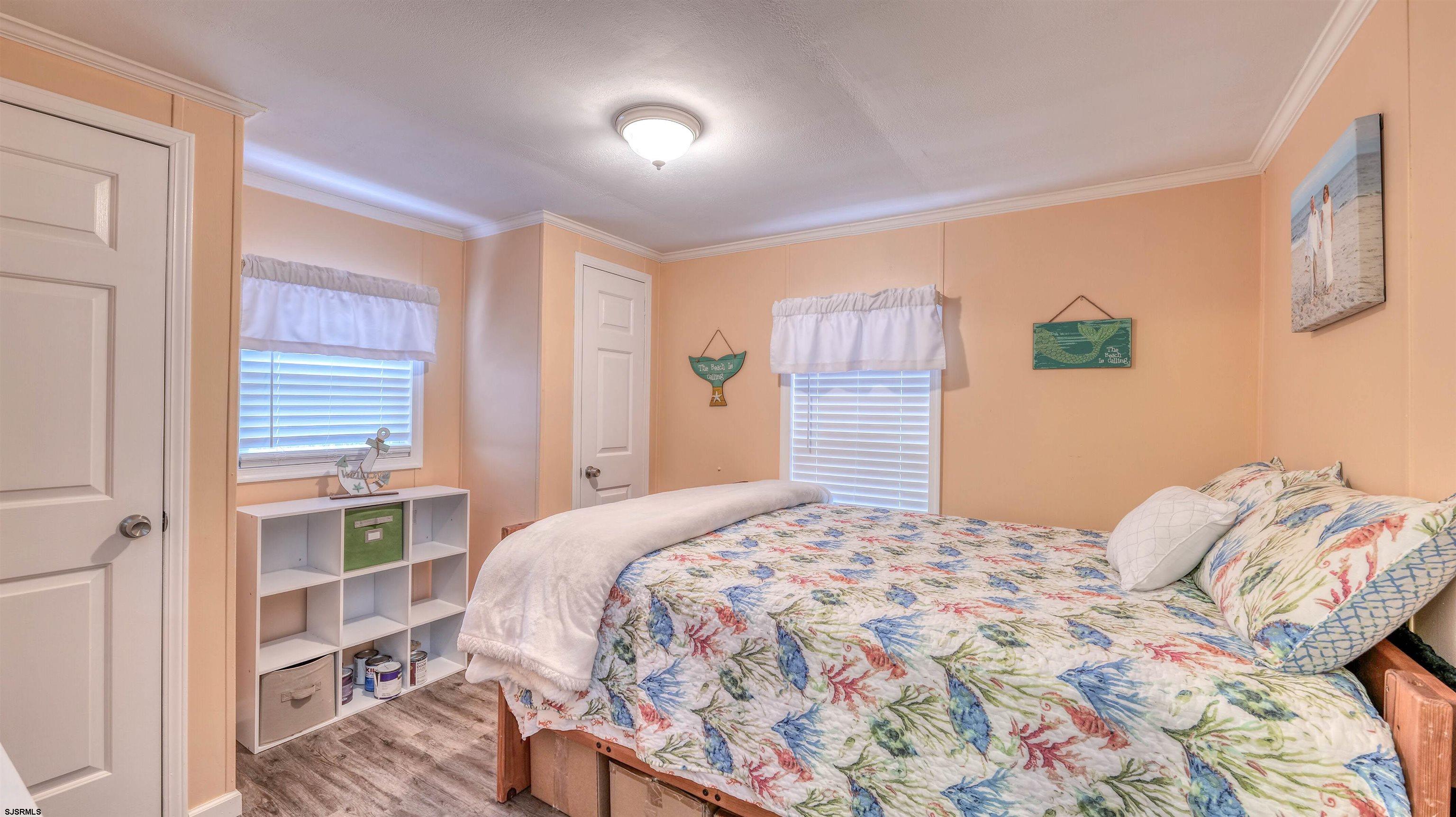 33 Defeo Lane Somers Point, NJ 08244 - Photo 19 of 29 a bedroom with a bed and a window