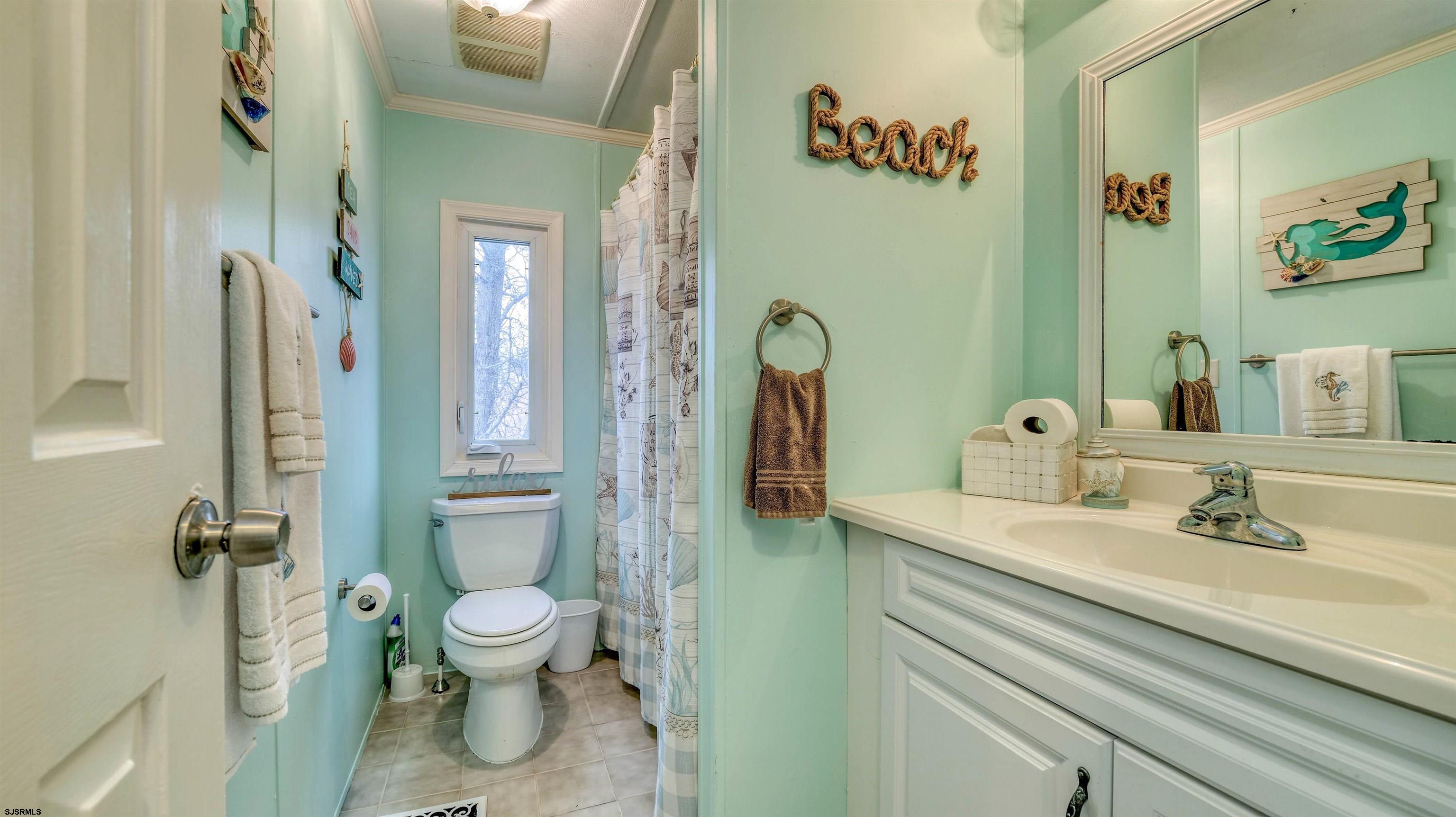 33 Defeo Lane Somers Point, NJ 08244 - Photo 20 of 29 a bathroom with a sink a toilet and shower