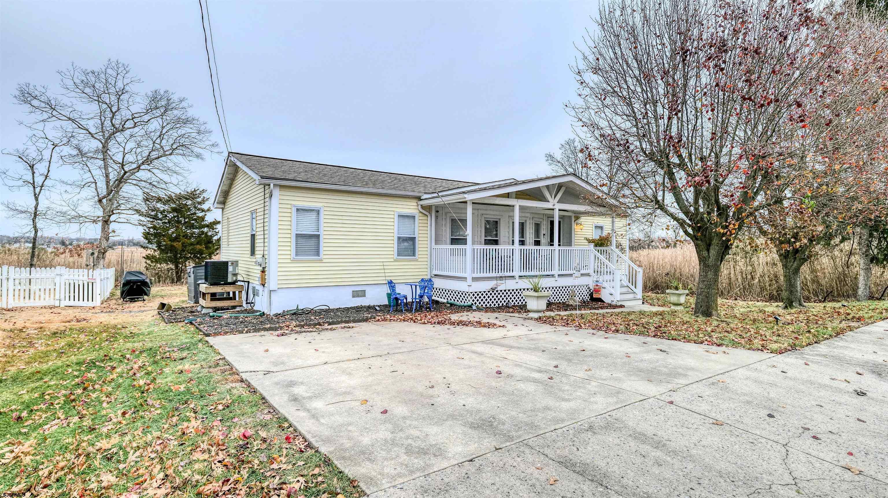 33 Defeo Lane Somers Point, NJ 08244 - Photo 2 of 29 a view of a house with snow on the roof