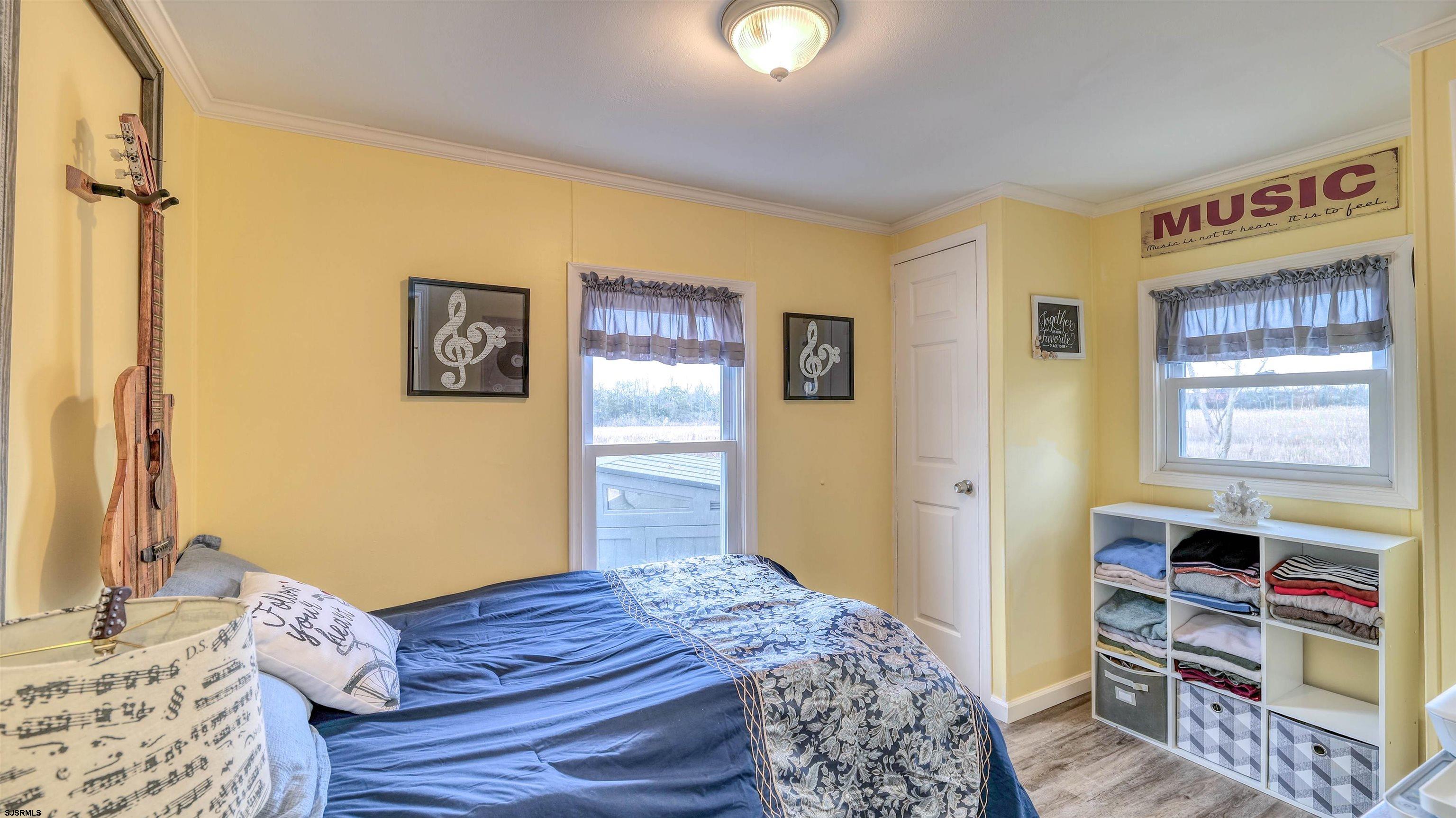 33 Defeo Lane Somers Point, NJ 08244 - Photo 21 of 29 a bedroom with a bed and a closet