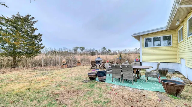 a view of a terrace with chairs