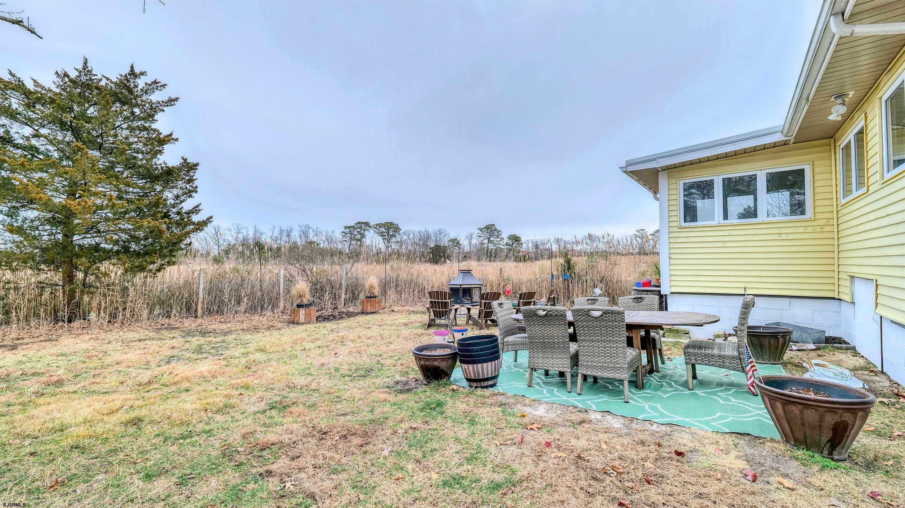 33 Defeo Lane Somers Point, NJ 08244 - Photo 22 of 29 a view of a terrace with chairs