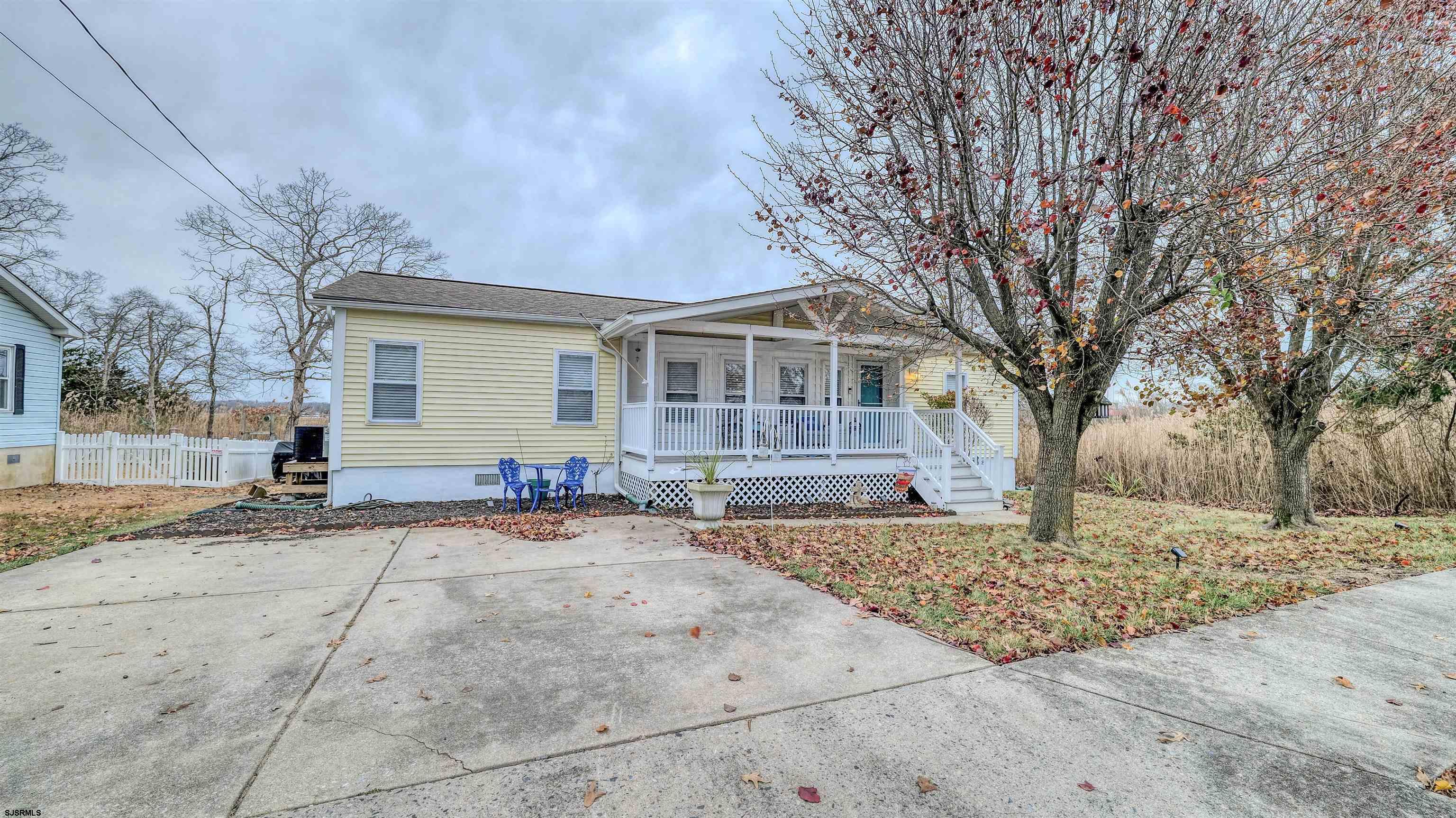 33 Defeo Lane Somers Point, NJ 08244 - Photo 25 of 29 a backyard of a house with seating space