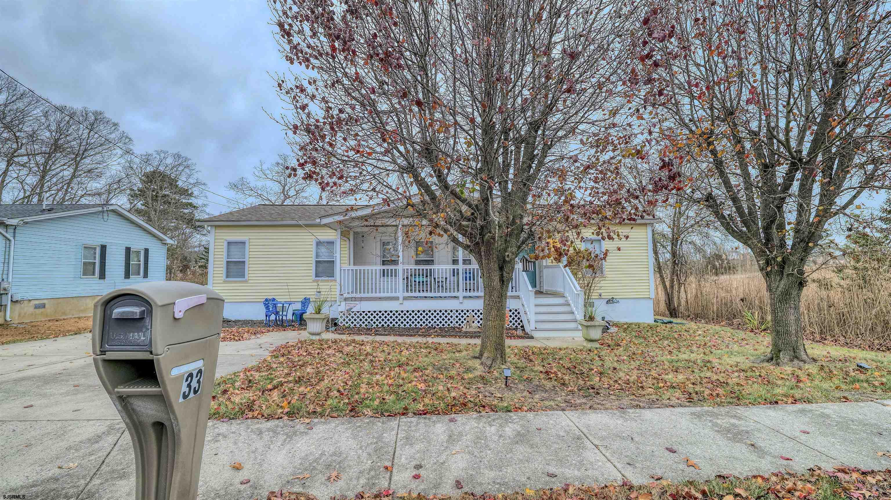 33 Defeo Lane Somers Point, NJ 08244 - Photo 26 of 29 a front view of a house with garden
