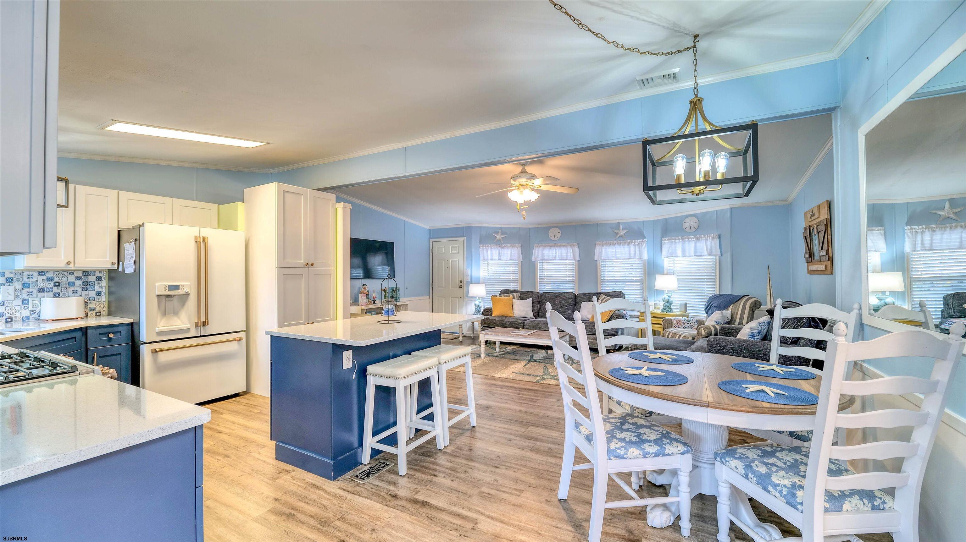 33 Defeo Lane Somers Point, NJ 08244 - Photo 9 of 29 a large kitchen with a table and chairs