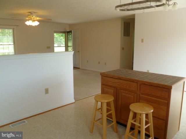 37 Frank Haines Road Paw Paw, WV 25434 - Photo 10 of 18 a view of a dining room with furniture and window