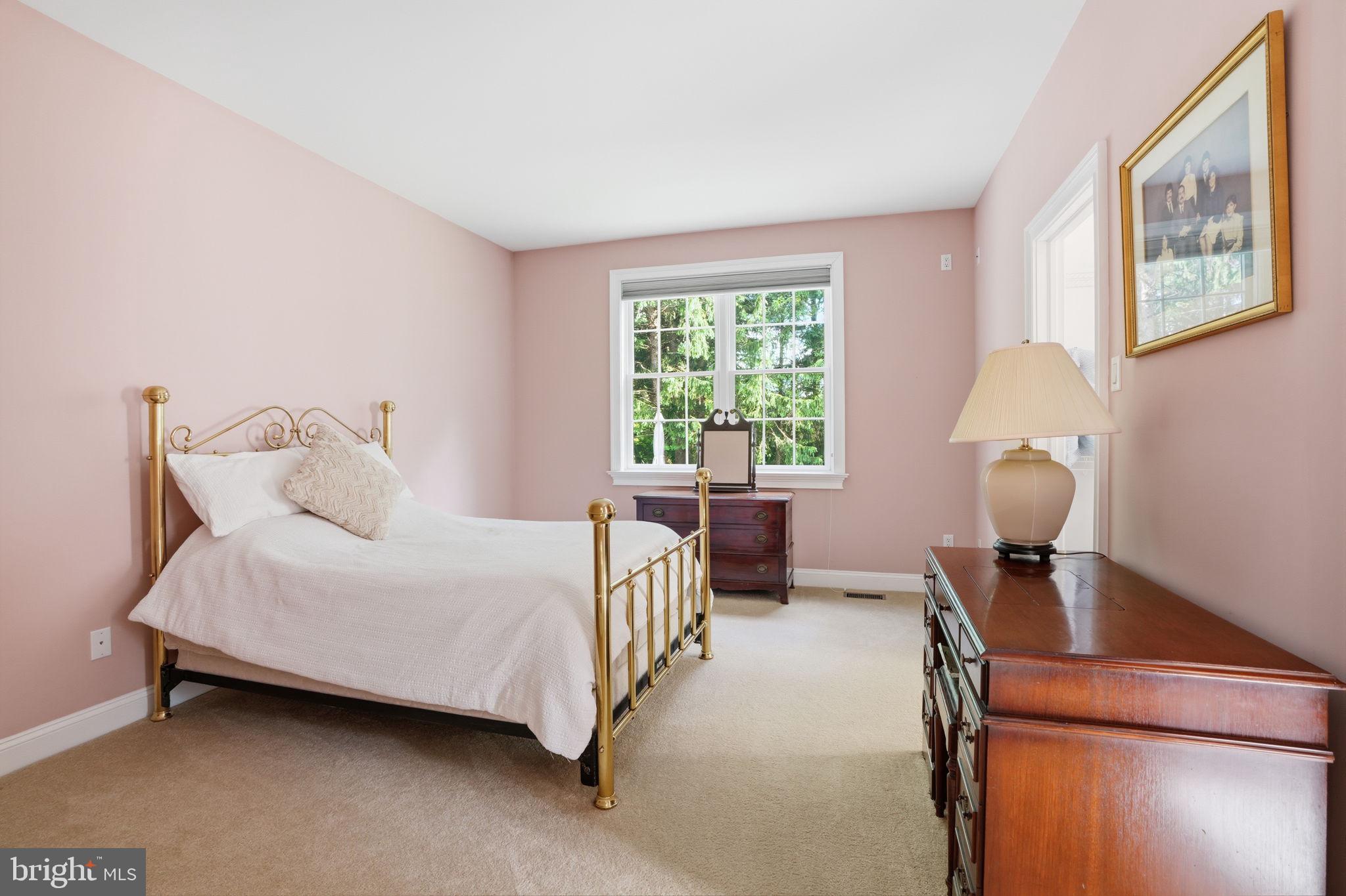 1588 Wrightstown Road Newtown, PA 18940 - Photo 47 of 81 a bedroom with a bed chair and a large window