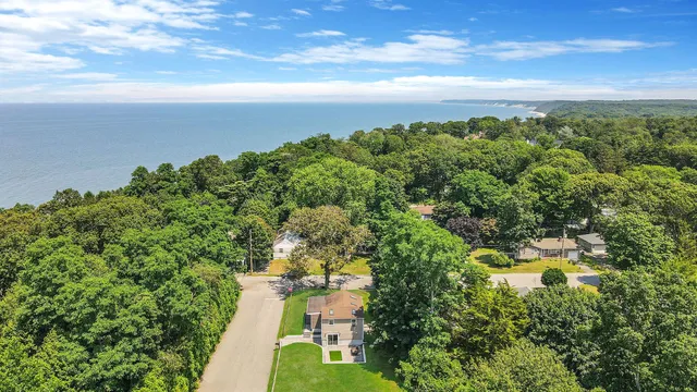 a view of a lake with a yard