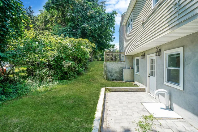 a view of a back yard of the house