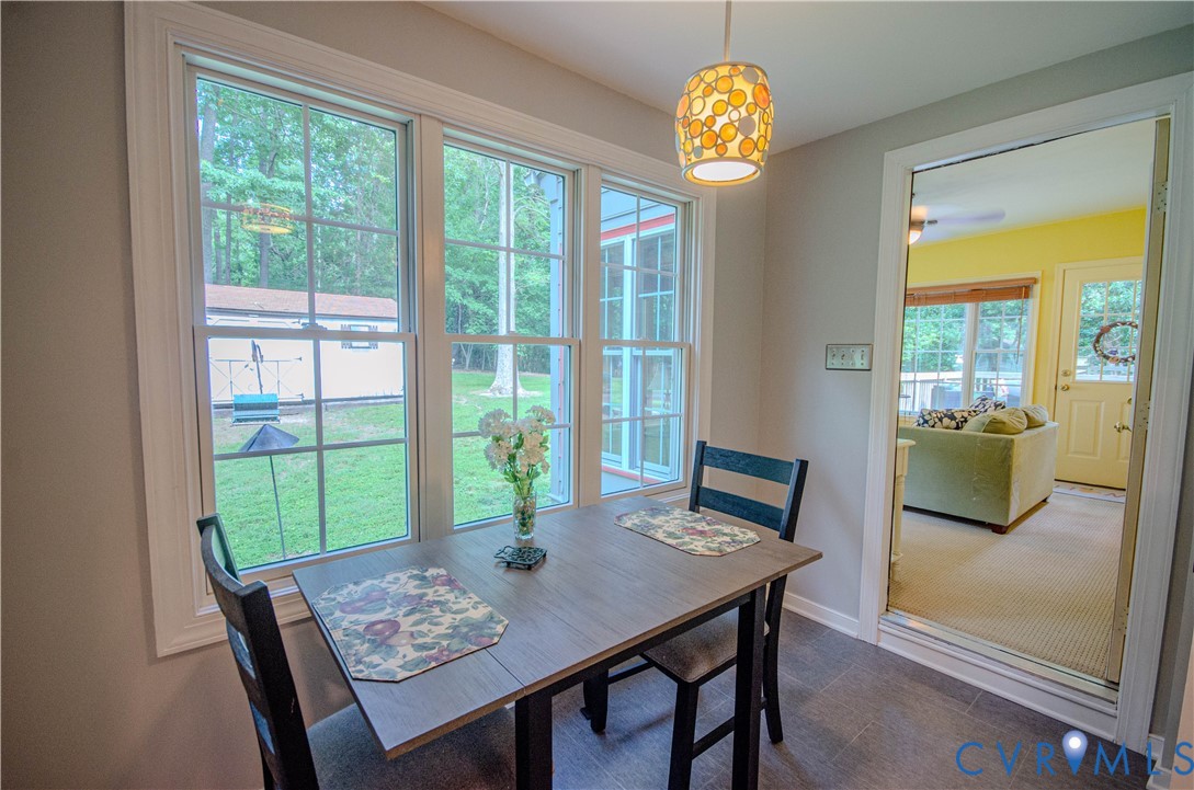 12500 Musical Lane Midlothian, VA 23113 - Photo 40 of 51 Dining area featuring a modern pendant light fixtu