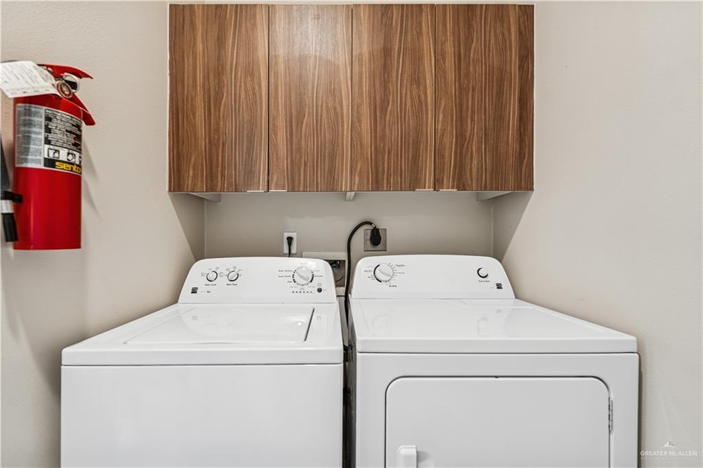1201 East Olympia Avenue, Unit 2 McAllen, TX 78503 - Photo 13 of 15 a utility room with dryer and washer