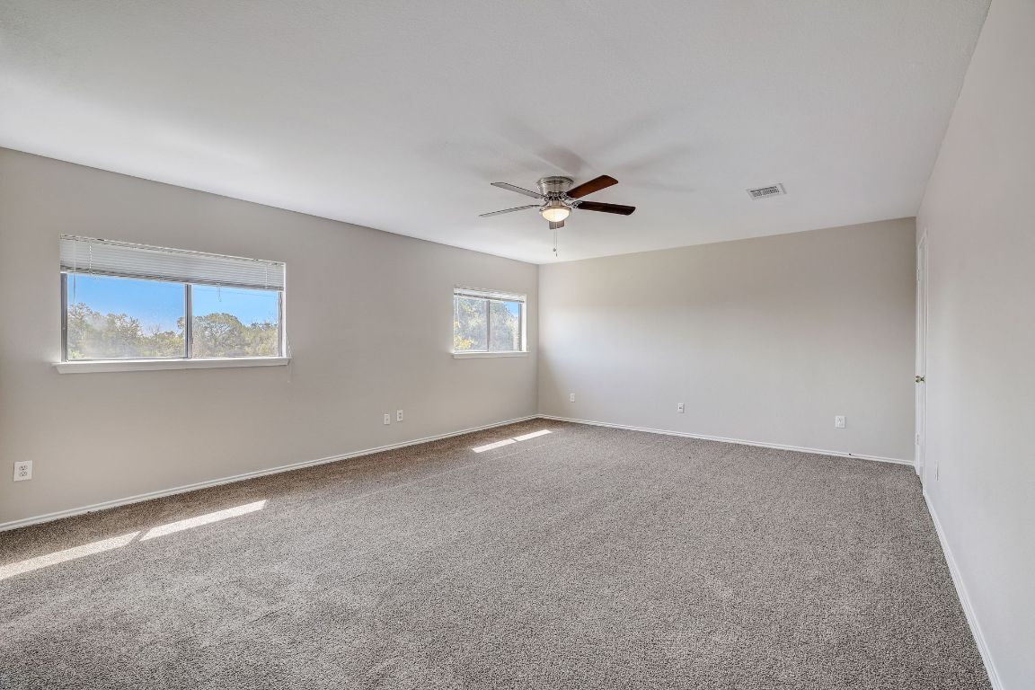 314 Bello Drive Leander, TX 78641 - Photo 17 of 35 a view of an empty room with a window