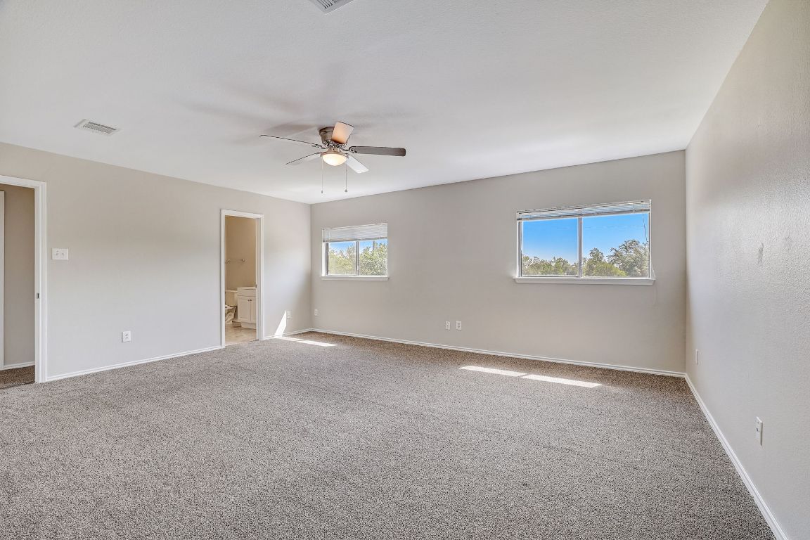 314 Bello Drive Leander, TX 78641 - Photo 18 of 35 a view of an empty room with a window