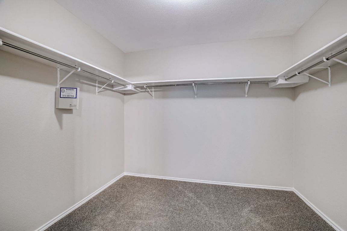 314 Bello Drive Leander, TX 78641 - Photo 22 of 35 a view of an empty walk in closet
