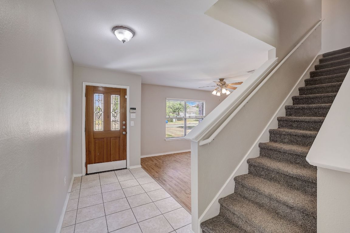 314 Bello Drive Leander, TX 78641 - Photo 3 of 35 a view of entryway and hall with wooden floor