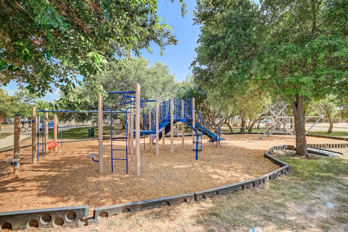 314 Bello Drive Leander, TX 78641 - Photo 35 of 35 a view of a park with swings