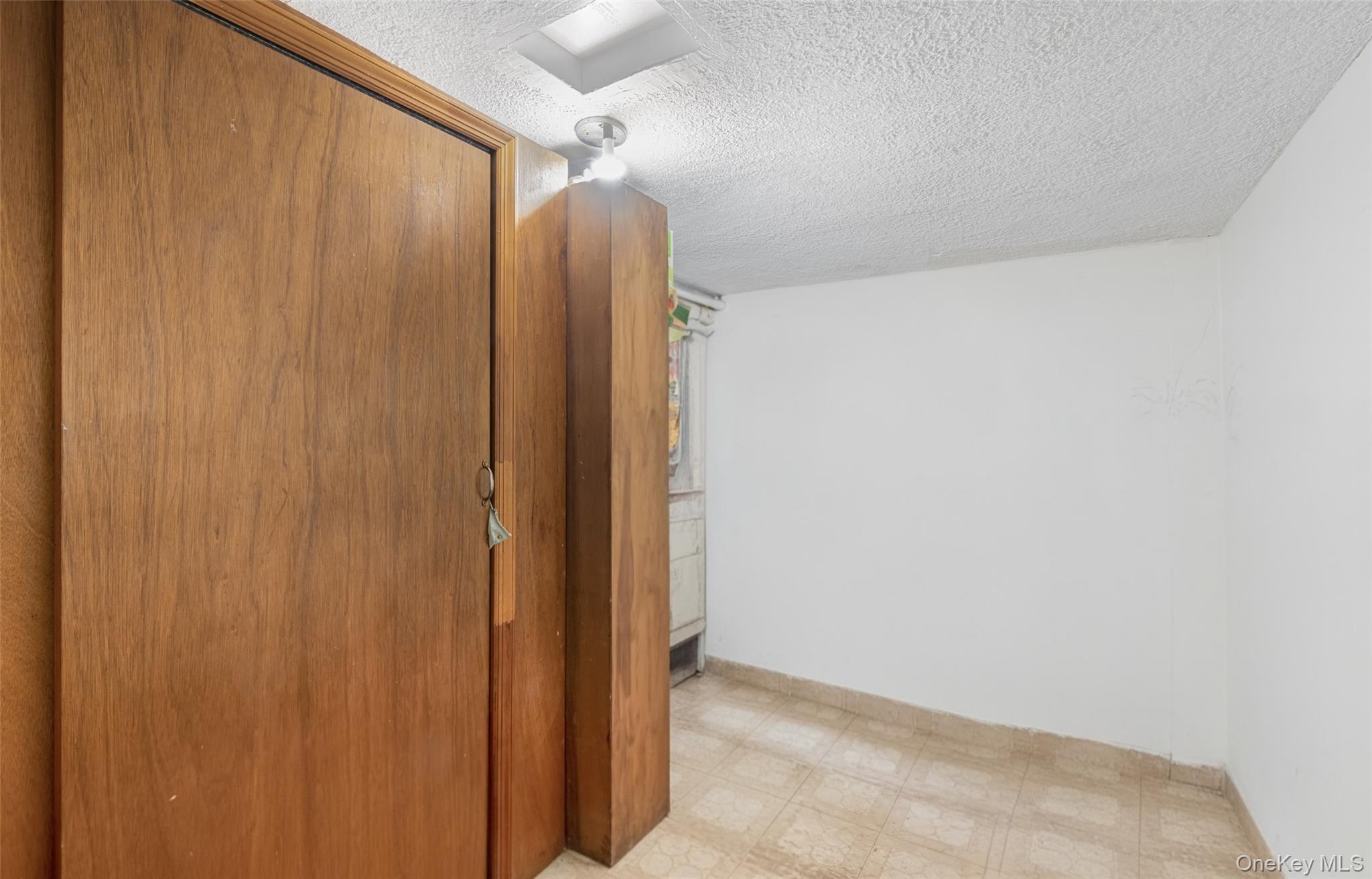 19-50 80th Street, Unit 1 Queens, NY 11370 - Photo 14 of 20 a view of a bathroom