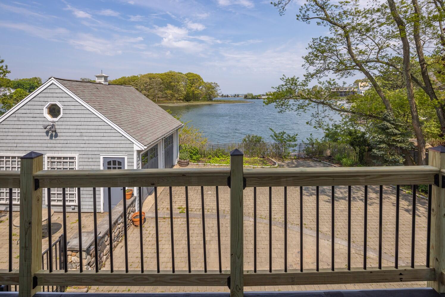 85 Roton Avenue Rowayton, CT 06853 - Photo 20 of 31 a view of a wooden deck and a yard