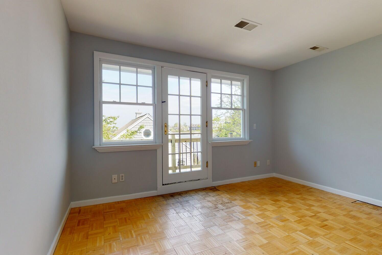 85 Roton Avenue Rowayton, CT 06853 - Photo 23 of 31 an empty room with windows