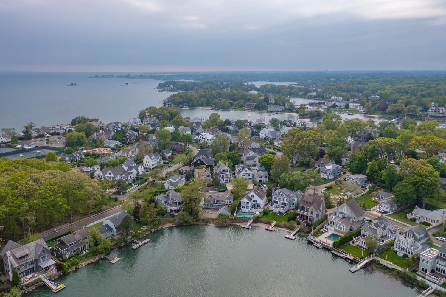 85 Roton Avenue Rowayton, CT 06853 - Photo 4 of 31 an aerial view of a houses with a street