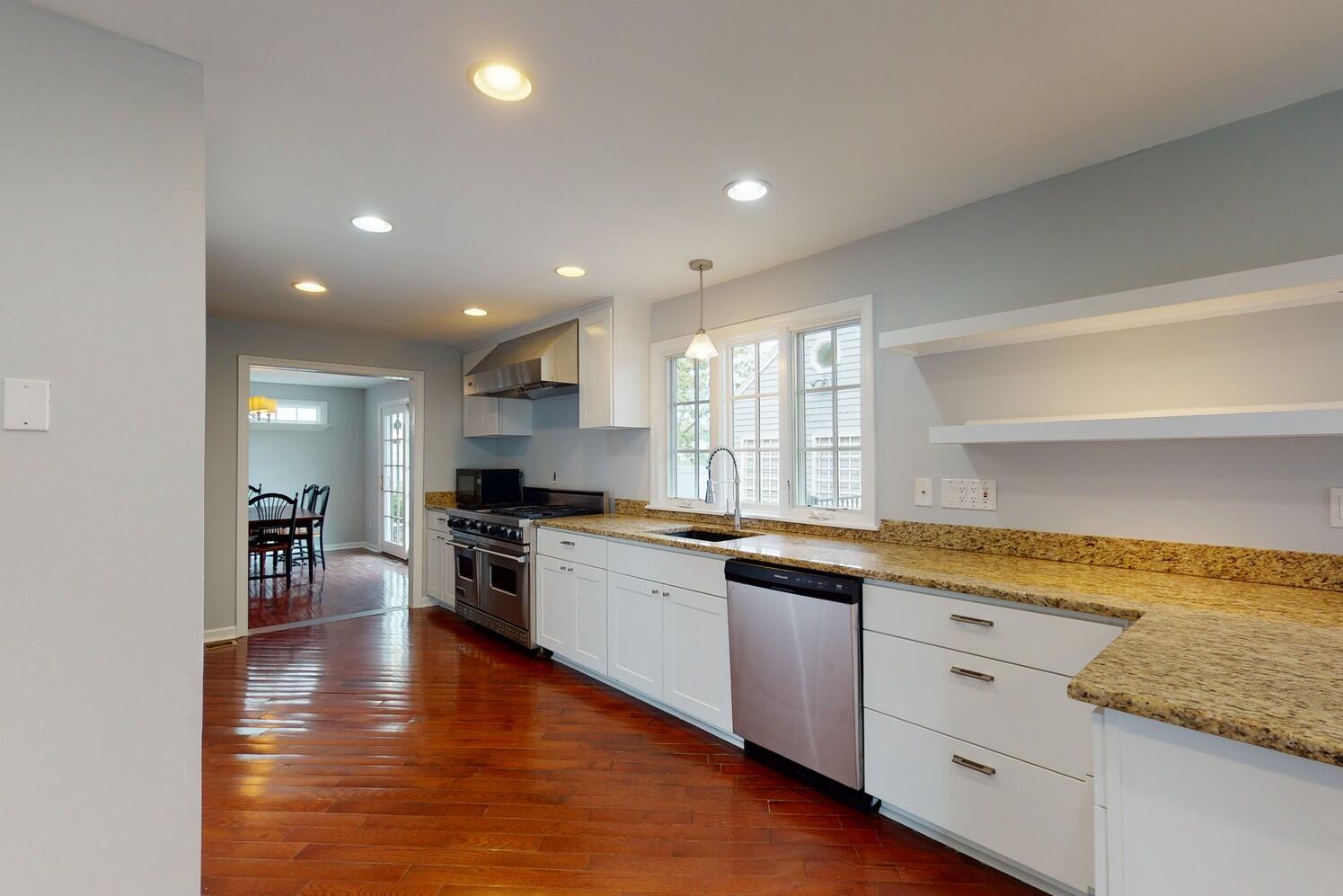 85 Roton Avenue Rowayton, CT 06853 - Photo 10 of 31 a large kitchen with stainless steel appliances granite countertop a lot of counter space and wooden floor