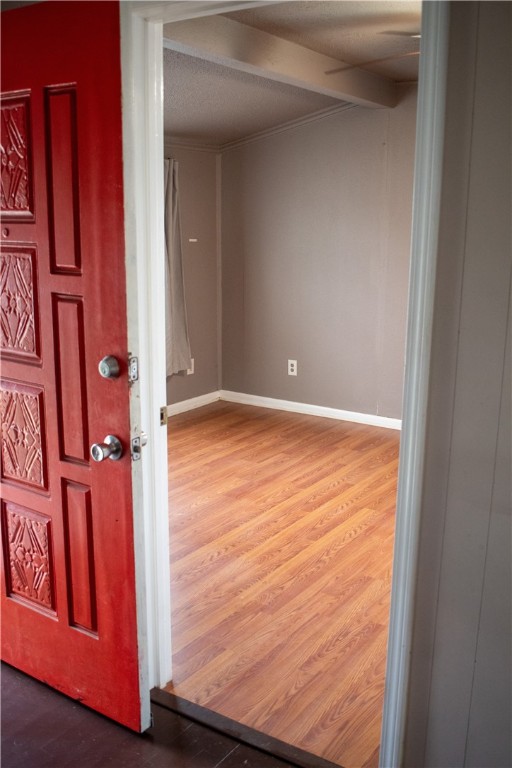 906 Rickey Drive Corpus Christi, TX 78412 - Photo 11 of 40 a view of an empty room with wooden floor and a window