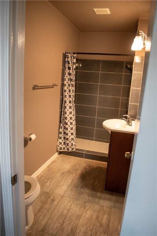906 Rickey Drive Corpus Christi, TX 78412 - Photo 14 of 40 a view of empty room with a sink and wooden floor