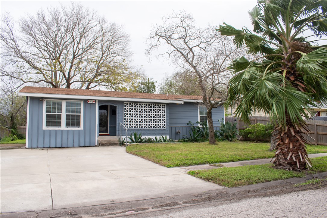 906 Rickey Drive Corpus Christi, TX 78412 - Photo 2 of 40 a front view of a house with yard and green space