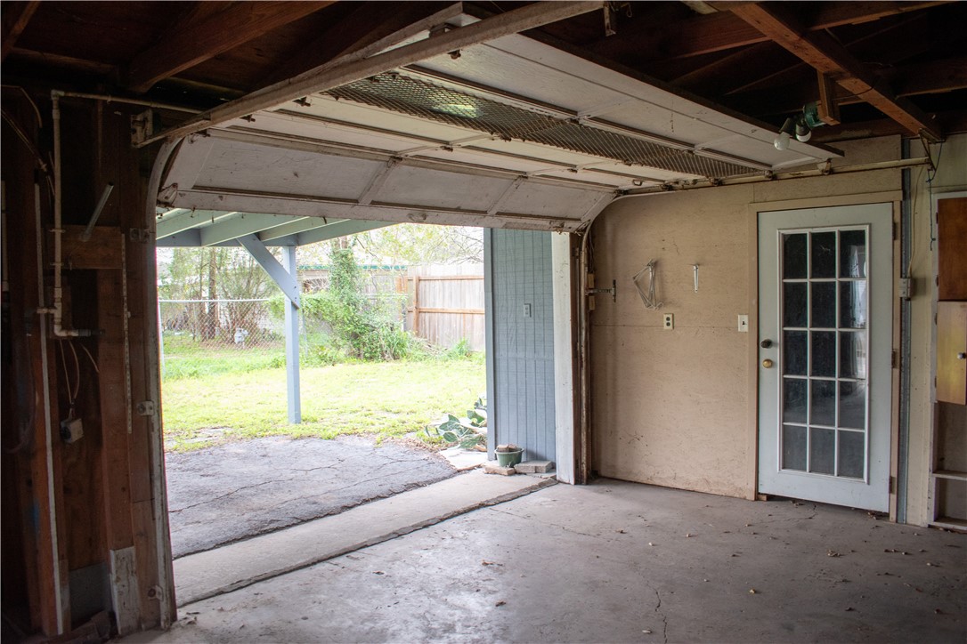 906 Rickey Drive Corpus Christi, TX 78412 - Photo 31 of 40 a view of a room with wooden floor and a porch