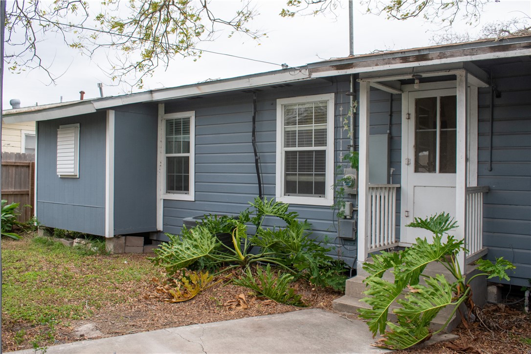 906 Rickey Drive Corpus Christi, TX 78412 - Photo 38 of 40 a front view of a house with garden