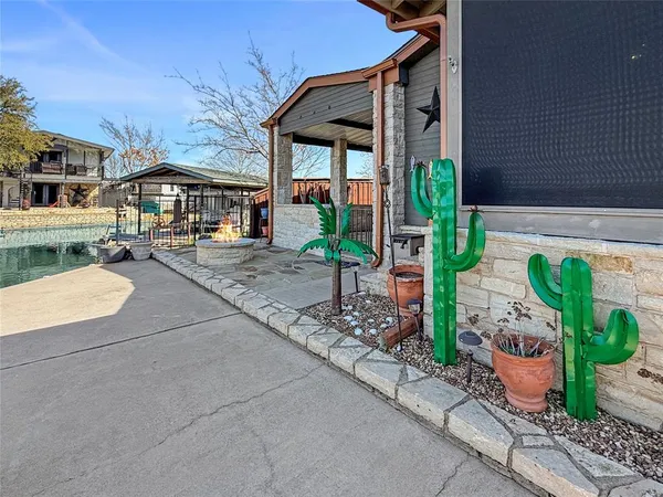 a view of swimming pool with seating space