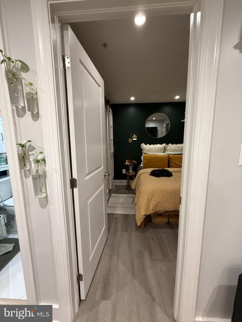 625 Park Road Northwest, Unit C8 Washington, DC 20010 - Photo 21 of 35 a walk in closet with view of bathroom