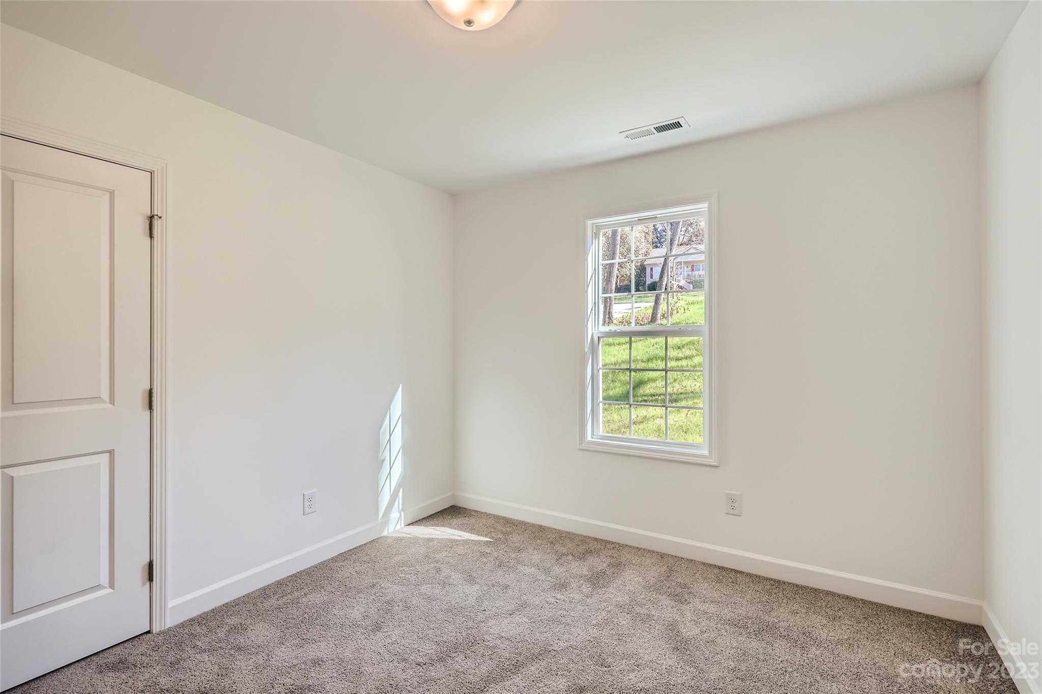 1 Hampton Church Road Charlotte, NC 28262 - Photo 7 of 11 an empty room with windows