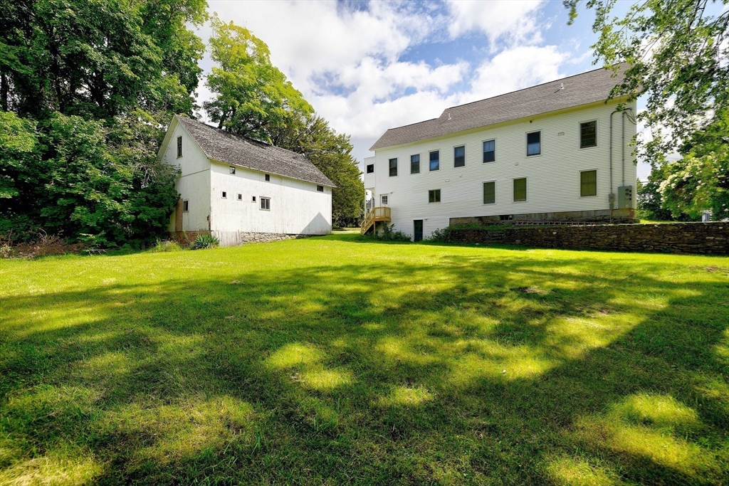 67-69 Petersham Road Hardwick, MA 01037 - Photo 3 of 38 a view of a white house with a yard