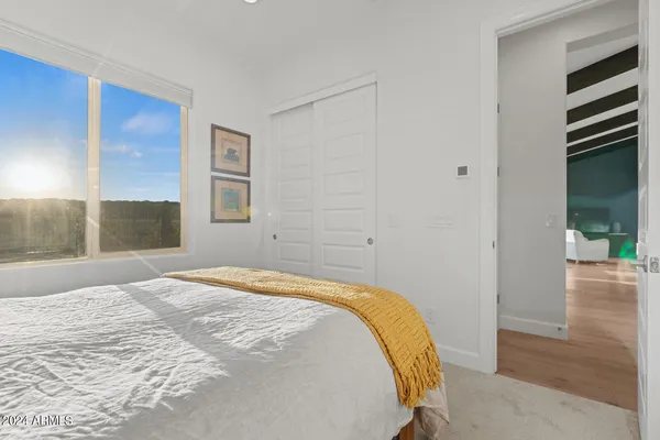 an aerial view of residential building and ocean