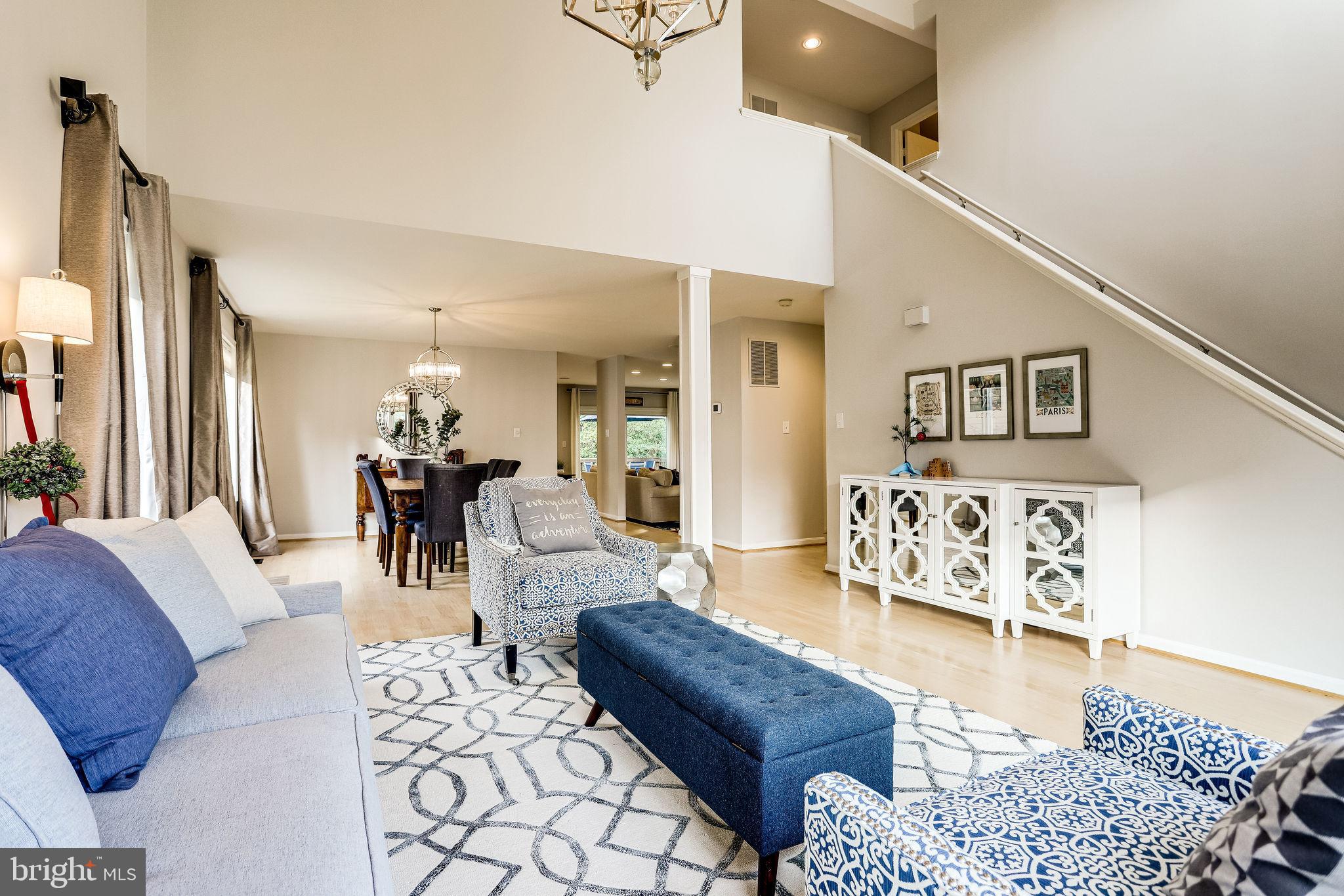 1302 Pavilion Club Way Reston, VA 20194 - Photo 9 of 63 Living room flows into dining room