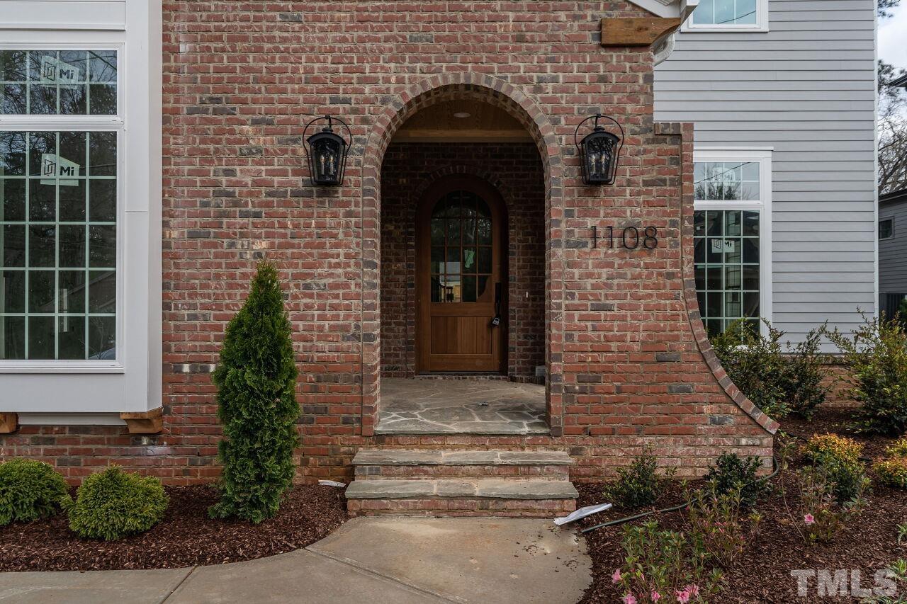 1108 Shelley Road Raleigh, NC 27609 - Photo 3 of 3 a front view of a house with plants