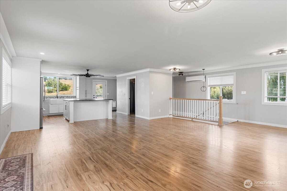 770 Lancaster Road Selah, WA 98942 - Photo 3 of 37 a view of a kitchen with wooden floor and electronic appliances