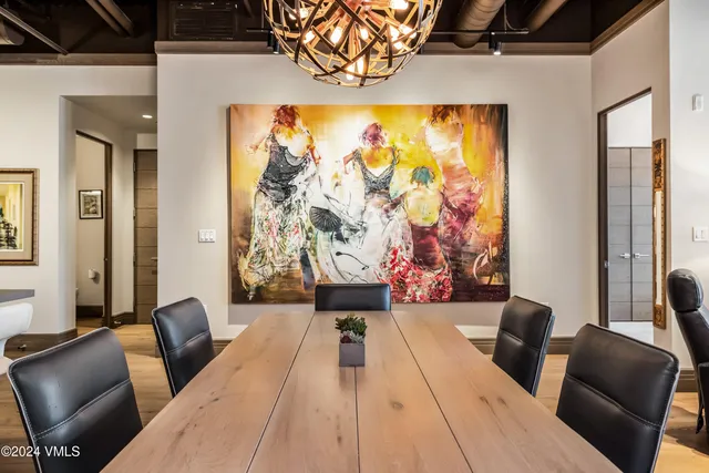 a water heater on a brick wall next to a blue wall