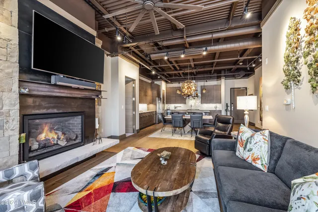 a bathroom with a sink mirror vanity and toilet
